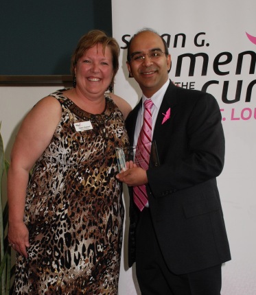 Komen St. Louis Executive Director Helen Chesnut presents our 2013 Health Professional of the Year Award to Dr. Ron Bose