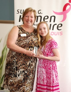 Komen St. Louis Executive Director Helen Chesnut presents our 2013 Young Philanthropist of the Year Award to Naomi Leask