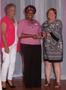 Patricia Polk (center) with Komen St. Louis Board Member Lillie Thomas and Executive Director Helen Chesnut